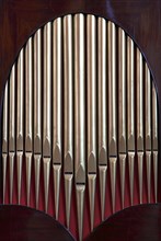 ENGLAND, West Sussex, Chichester, "Cathedral Interior, detail of minature organ showing the pipes."