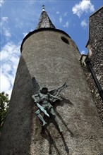 ENGLAND, East Sussex, Lewes, "High Street, St Michael's Church detail with sculpture of the