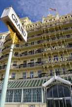 ENGLAND, East Sussex, Brighton, The De Vere Grand Hotel entrance and facade of rooms with balconies
