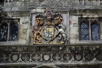 ENGLAND, Wiltshire, Salisbury, "Detail of weather worn North Gate in the High Street. Royal Coat of