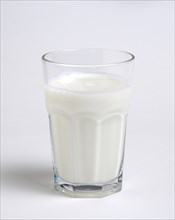 DRINK, Milk, Glass, Tumbler glass of dairy milk on a white background.