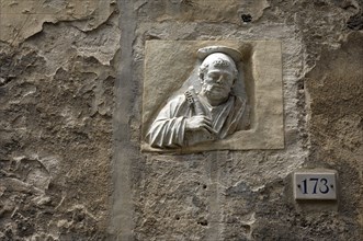 ITALY, Tuscany, Florence, Religious Figure in Wall.