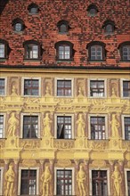 Poland, Wroclaw, detail of building facade with tromp l'oiel painted mural in the Rynek old town