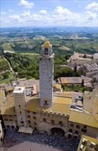 ITALY, Tuscany, San Gimignano, View of the Palazzo Vecchio del Podesta of 1239 with its medieval