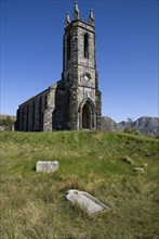 IRELAND, County Doneghal, Poisoned Glen, Ruined Church of Ireland building with gravestone in