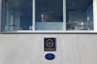 England, West Sussex, Shoreham-by-Sea, National Coastwatch Institution look out post next to the