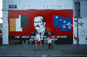Ireland, North, Belfast, Irish Republican mural with an image of James Connelly on the side of a