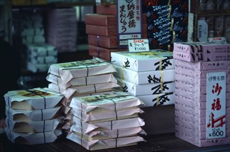 Japan, Honshu, Tokyo, Bento boxes of packed prepared meals on display at a food kiosk on Tokyo