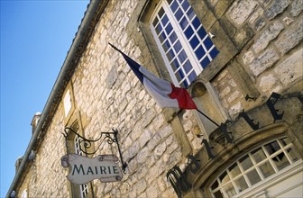 France, Aquitaine, Villefranche-du-Perigord, Mairie Town Hall stone building with French Tricolour