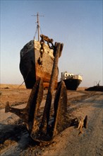 Kazakhstan, Aral Sea, Rusting grounded ships on the former sea bed.