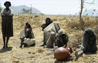 Ethiopia, Drought, Famine victims on parched land.