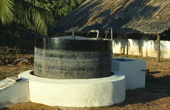 India, Biogas Digester producing methane gas from cattle manure.