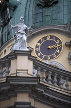Germany, BErlin, Charlottenburg Palace, Statue & clock face on dome.
