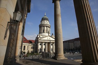Germany, Berlin,Gendermenmarkt,  Franzosischer Dom French Cathedral seen through the columns of the