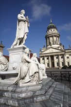 Germnay, Berlin, Gendermenmarkt, Schiller Monument with the Franzosischer Dom in the background.