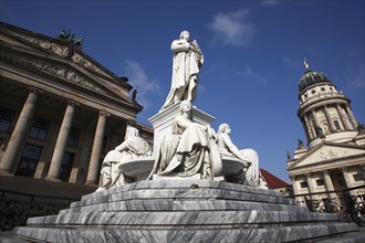 Germany, Berlin, Gendermenmarkt, Schiller Monument with the concert hall to the left and the