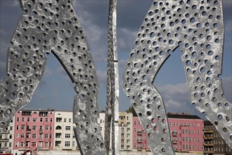 Germany, Berlin, Detail of Molecule Men sculpture 30 metres in height by Jonathan Borofsky on River