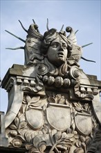 Poland, Krakow, Head of Apollo on top of the entrance to the Palace of Arts built in 1901 for the