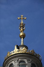 Poland, Krakow, Crucifix on dome of Wawel Cathedral.