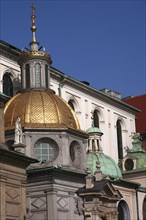 Poland, Krakow, Gold and green domes of Wawel Cathedral.