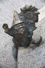 Poland, Wroclaw, diminutive statue of a gnome by Tomasz Moczek.