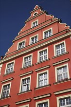 Poland, Wroclaw, pastel coloured building facade in Slony Place.
