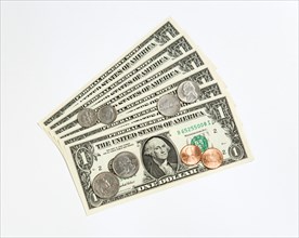 Business, Finance, Money, US Currency Paper one dollar banknote and coins of one cent penny five