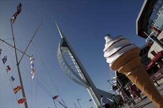 England, Hampshire, Portsmouth, Old Town, Gun Wharf Quay, Spinnaker tower and naval mast with flags