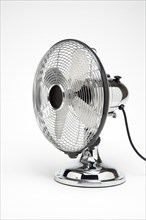 Weather, Environment, Control, Stainless Steel Retro desk or table electric cooling fan on a white