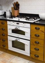 Architecture, Interiors, Kitchen, White domestic gas hob and electric oven household appliance set