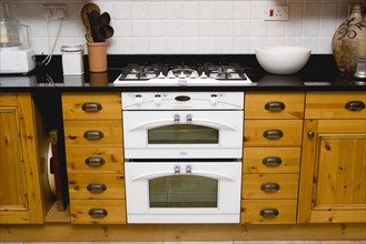 Architecture, Interiors, Kitchen, White domestic gas hob and electric oven household appliance set