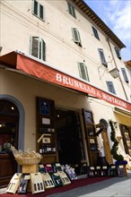 ITALY, Tuscany, Montalcino, Val D'Orcia Brunello di Montalcino Enoteca or wine shop with dispaly of