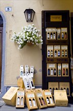ITALY, Tuscany, Montalcino, Val D'Orcia Brunello di Montalcino Enoteca or wine shop with dispaly of