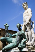 ITALY, Tuscany, Florence, The 1575 Mannerist Neptune fountain with the Roman sea God surrounded by