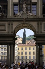 ITALY, Tuscany, Florence, The 16th century Vasari corridor of the Uffizi with sightseeing tourists.