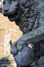 ITALY, Tuscany, Florence, The 1533 statue of Hercules and Cacus by Bandinelli seen through the legs