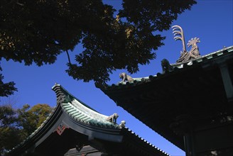 Japan, Tokyo, Kanda- Yushima Seido Confucian Shrine, details of roof wall surrounding  shrine
