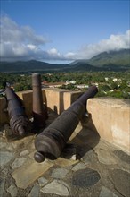 VENEZUELA, Margarita Island, La Asuncion, Canons at the terrace of Castillo de Santa Rosa fort