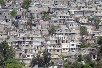HAITI, Isla de Laganave, Slum housing on hillside.