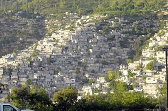 HAITI, Isla de la Laganave, Slum Housing on hillside.