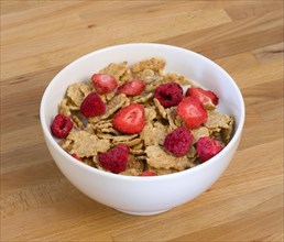 Food, Meals, Cereals, White breakfast bowl of bran flake cereal with freeze dried fruits of