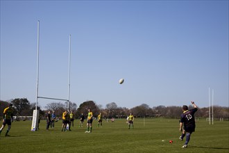 England, West Sussex, Shoreham-by-Sea, Rugby Teams playing on Victoria Park playing fields. Player