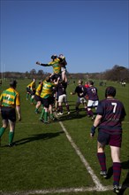 England, West Sussex, Shoreham-by-Sea, Rugby Teams playing on Victoria Park playing fields. Ball