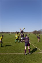 England, West Sussex, Shoreham-by-Sea, Rugby Teams playing on Victoria Park playing fields. Ball
