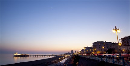 England, East Sussex, Brighton, Kemptown, view over Madeira Drive from Marine Parade with the pier