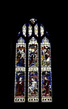 England, West Sussex, East Grinstead, Details of the staiined glass windows in Church of St Swithun