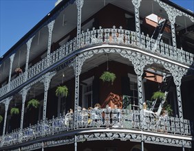 USA, Louisiana, New Orleans, French quarter buildings with wrought iron balconies.
