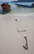 Malaysia, Pulau Perhentian Kecil Coast, Terrengganu,  Anchor with a stretched chain stuck in the