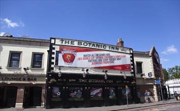 Ireland, North, Belfast, Malone Road, Exterior of the Botanic Inn bar with world cup banner on the