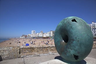 England, East Sussex, Brighton, Donut shaped sculpture on the seafront.